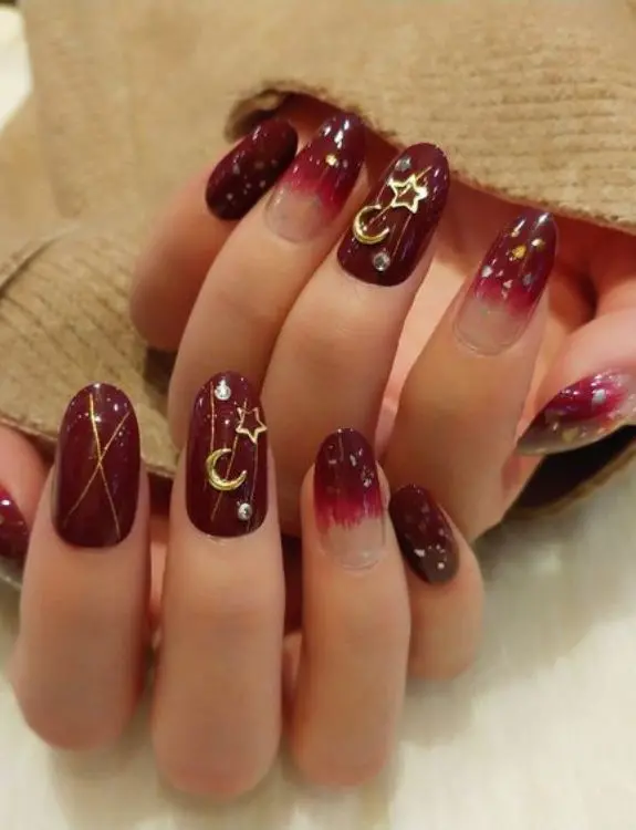 star decals on burgundy nails